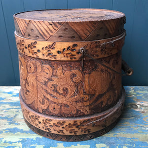 A beautiful early Nordic, carved and hot poker-worked wooden vessel with lid and handle. hand carved with peony and lily flowers and a stylised oak leaf patten on the bindings. would make an ideal biscuit barrel! - SHOP NOW - www.intovintage.co.uk