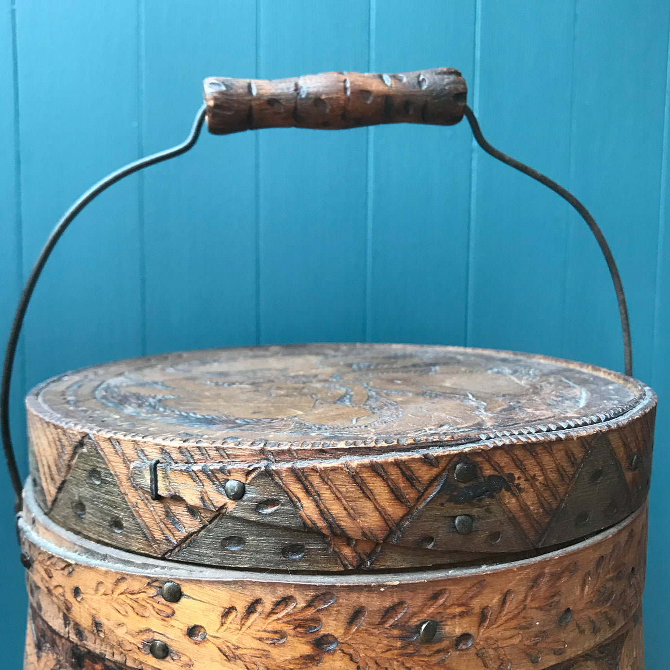 A beautiful early Nordic, carved and hot poker-worked wooden vessel with lid and handle. hand carved with peony and lily flowers and a stylised oak leaf patten on the bindings. would make an ideal biscuit barrel! - SHOP NOW - www.intovintage.co.uk