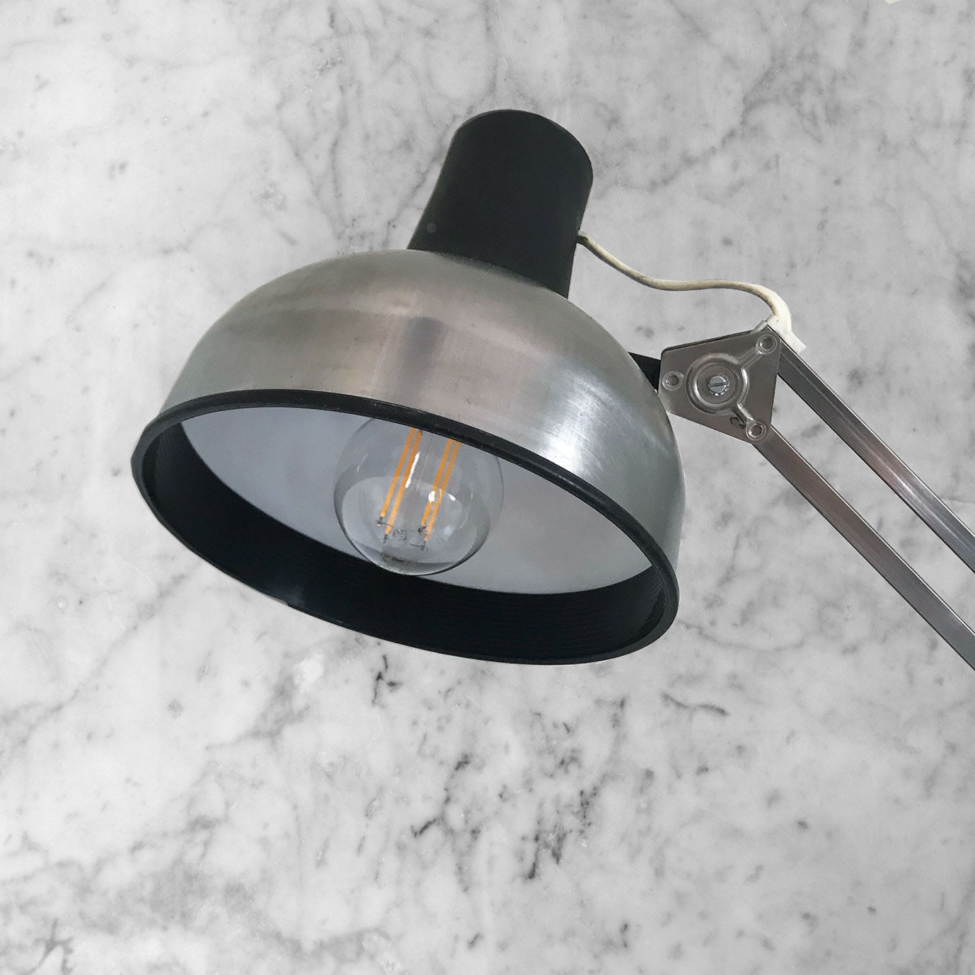 Smart Finish P12 Lival Lamp. Good clean example with a smart aluminium shade that locks into a black plastic bulb housing. The lamp has a clamp at its base that attaches to the side of your desk - SHOP NOW - www.intovintage.co.uk