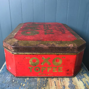 A rare OXO Toffee Tin made to hold the very short-lived product Oxo Toffee. The inside lid graphics state that the toffee&nbsp;"Contains Oxo Fluid Beef and Full-Cream Milk" - SHOP NOW - www.intovintage.co.uk