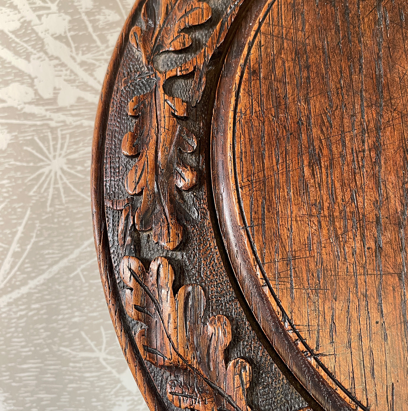 A beautifully deep carved Antique Oak Breadboard with pretty oak leaf detail to the edge. Signed to the back. In excellent condition and still nice and flat with no warping - SHOP NOW - www.intovintage.co.uk