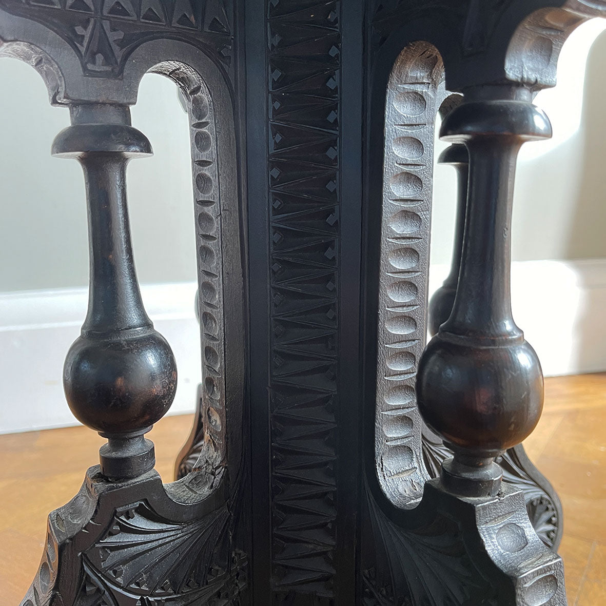 A Carved Ebonised Occasional Table. It has an octagonal top and is covered in beautiful decorative carving - SHOP NOW - www.intovintage.co.uk