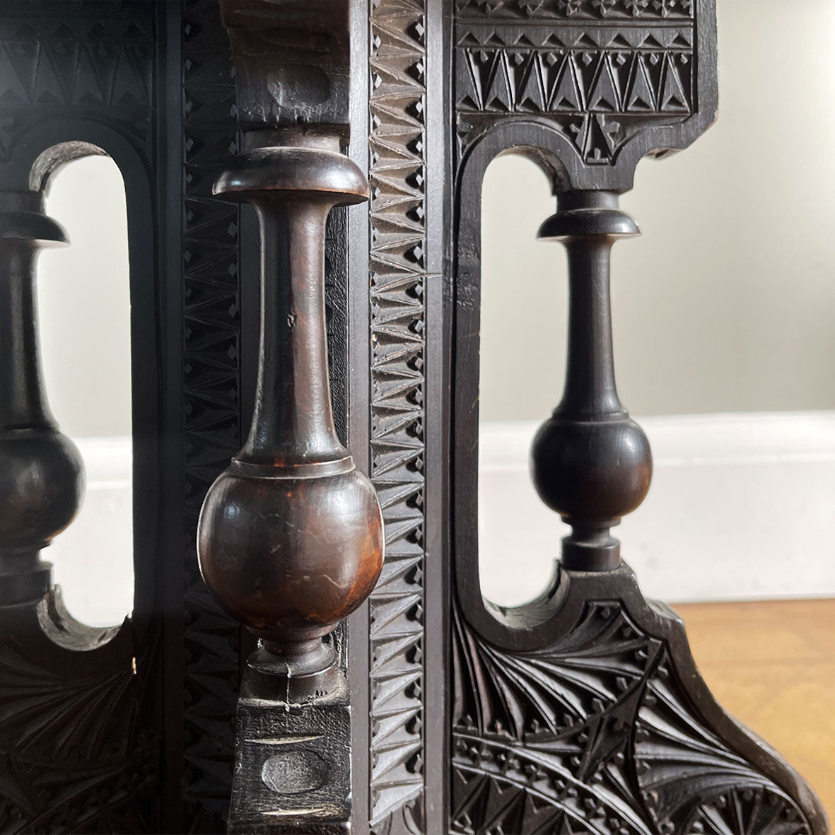 A Carved Ebonised Occasional Table. It has an octagonal top and is covered in beautiful decorative carving - SHOP NOW - www.intovintage.co.uk