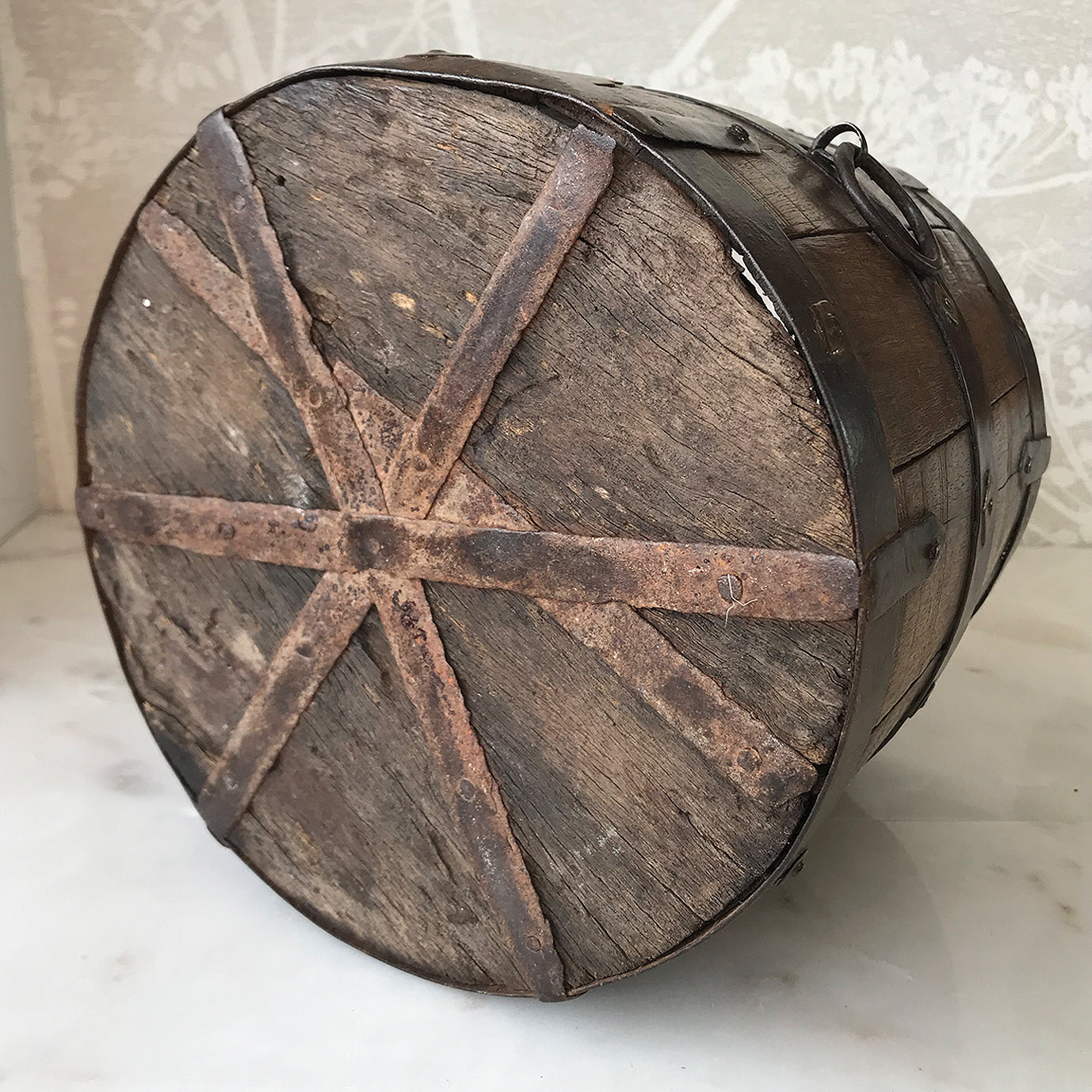 A true surviver this. A loved wooden vessel that has been very well looked after over the years. Hand made from oak, steel and brass. It has 3 steel handmade rings with handmade nails and crude squarish brass washers holding together the oak slats - SHOP NOW - www.intovintage.co.uk