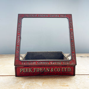 A Peak Frean & Co Biscuit Tin Lid with glass top display window. Original glass and fantastic aged patina to graphics - SHOP NOW - www.intovintage.co.uk