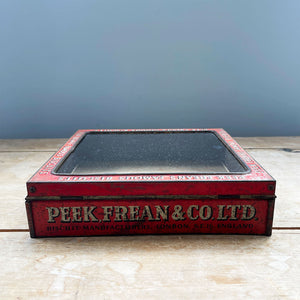 A Peak Frean & Co Biscuit Tin Lid with glass top display window. Original glass and fantastic aged patina to graphics - SHOP NOW - www.intovintage.co.uk