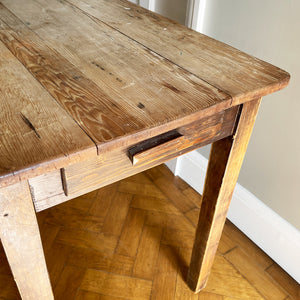 An Antique Rustic Pine Kitchen Table with handy draw and a superb age worn top. It sits upon four simple legs. It's just got that bang on look. - SHOP NOW - www.intovintage.co.uk