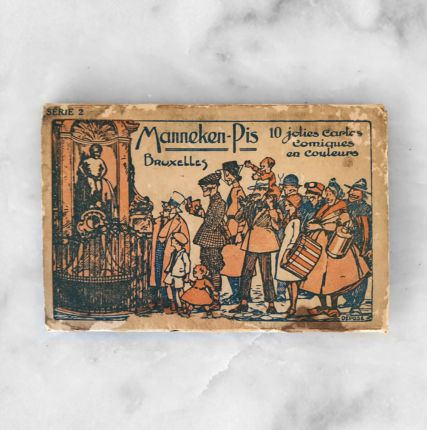 10 saucy vintage postcards from Belgium. All the stories are centred around the Mannekin Pis statue, a small boy taking a widdle! SHOP NOW - www.intovintage.co.uk