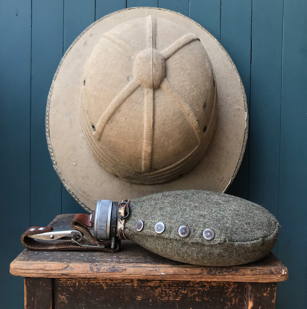 Going on safari? Then you need a Vintage Pith Helmet and Canteen! Made in France the hat is best quality solid cork and covered in canvas and has a fantastically designed inner label with a cool looking lion. The vintage canteen in made of aluminium with a screw top and has a felt studded jacket - SHOP NOW - www.intovintage.co.uk