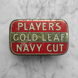 Nice Player's Gold Leaf Navy Cut Tobacco with a hinged lid from around the WW2 era. Great graphics to the front, nice and deep and would have held two ounces of tobacco. - SHOP NOW - www.intovintage.co.uk