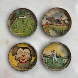 A set of 4 charming Vintage Pocket Games made in the U.S Zone of Germany by D.R.G.M. Using your jiggling skills you have negotiate the small ballbearings, shapes and figures in to their correct positions. Wonderful illustrations and colours and in fantastic condition - SHOP NOW - www.intovintage.co.uk