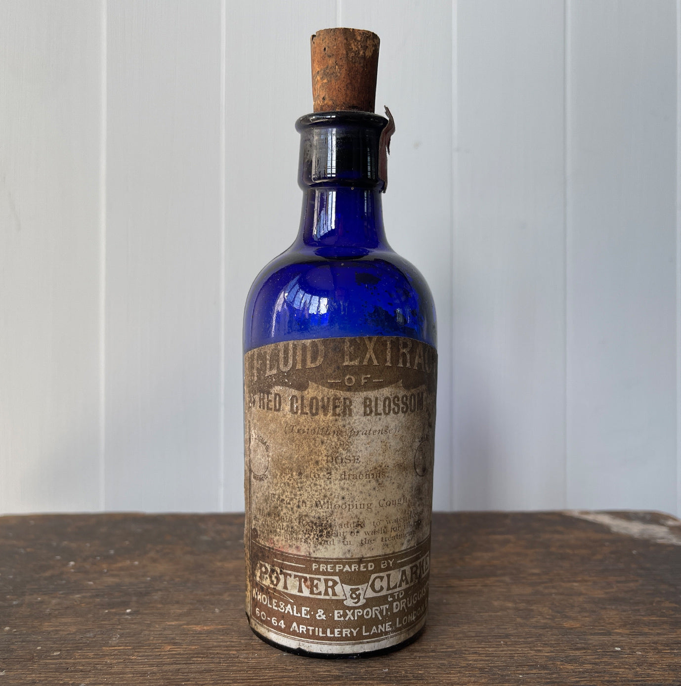 A Vintage Apothecary blue bottle with cork stopper for Red Clover Blossom. These bottles look great displayed in the bathroom or in a curio cabinet - SHOP NOW - www.intovintage.co.uk