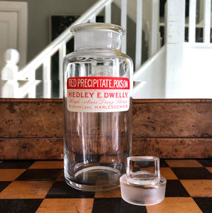 Vintage Clear Apothecary Poison Bottle with an original paper label from Hedley E. Dwelly, High-Class Drug Stores, 41, Acton Lane, Harlesden. N.W. London - SHOP NOW - www.intovintage.co.uk