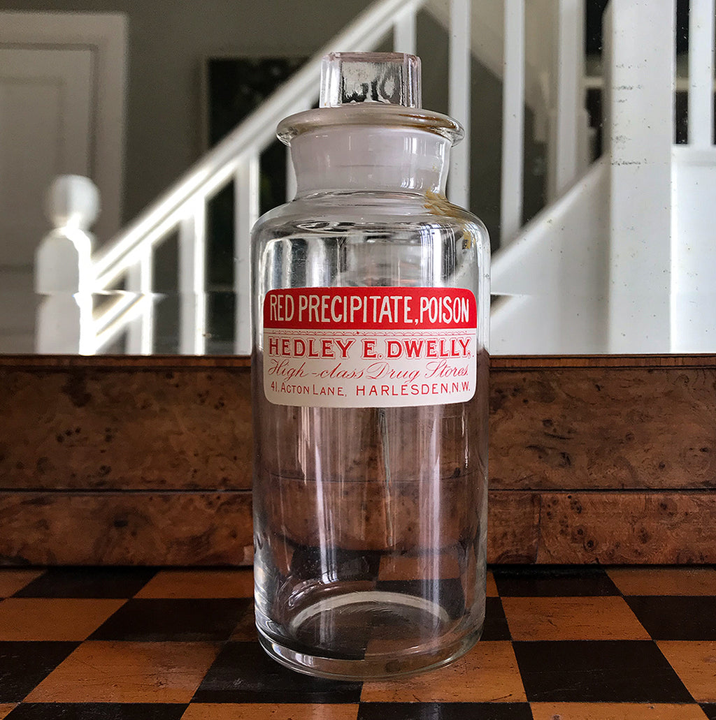 Vintage Clear Apothecary Poison Bottle with an original paper label from Hedley E. Dwelly, High-Class Drug Stores, 41, Acton Lane, Harlesden. N.W. London - SHOP NOW - www.intovintage.co.uk