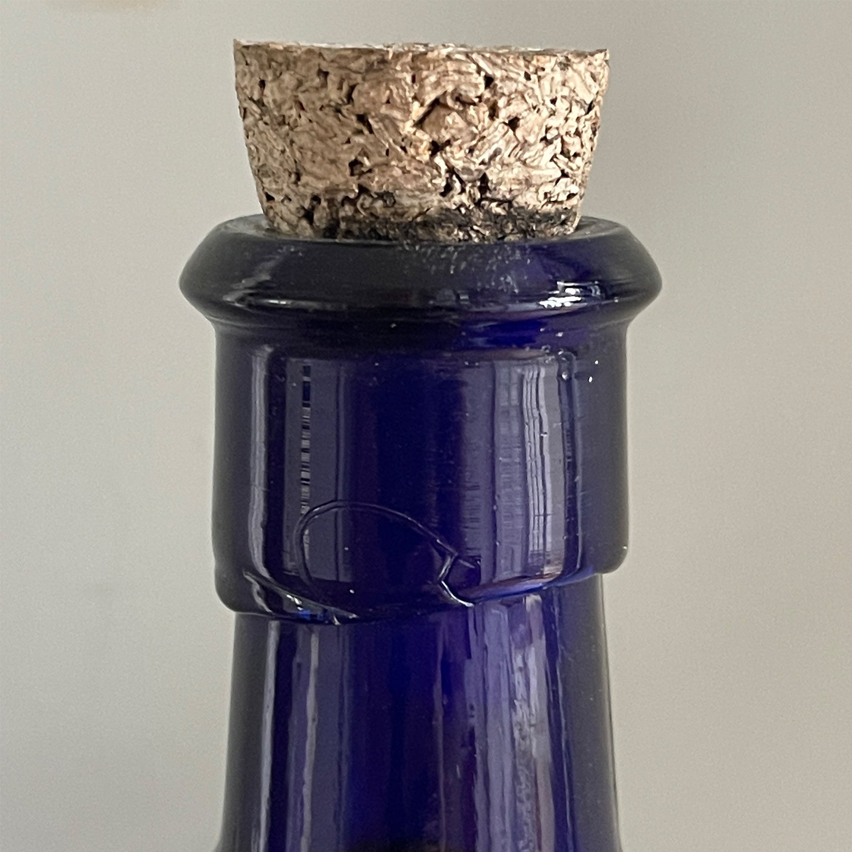 A Large Victorian Poison Bottle with cork stopper. It has fluted sides and two moulded 'POISON' words across the front and back shoulders. These bottles look great displayed in the bathroom or in a curio cabinet - SHOP NOW - www.intovintage.co.uk