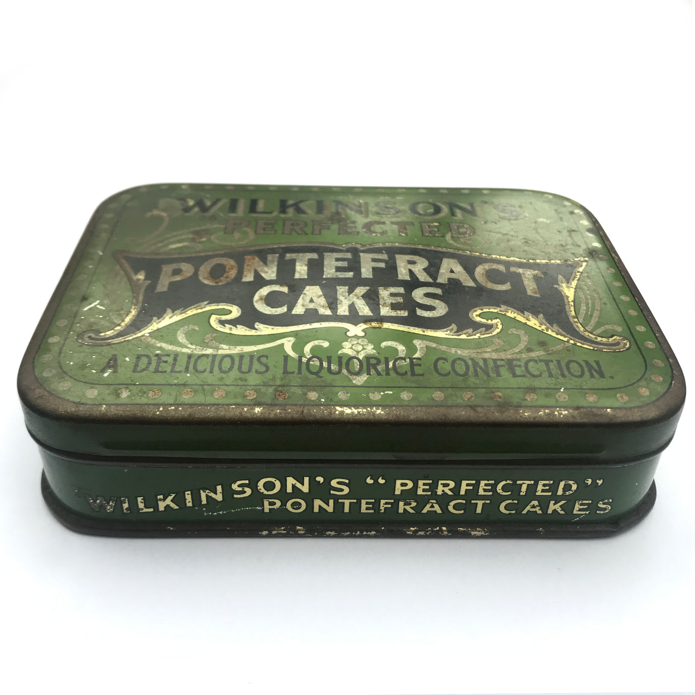 A rare Vintage 1920s Sample size Wilkinson's Pontefract Cake Tin with good patina. Pontefract Cakes were liquorice flavoured treats that were 'Highly recommended and always reliable!' - SHOP NOW - www.intovintage.co.uk