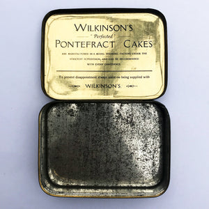 A rare Vintage 1920s Sample size Wilkinson's Pontefract Cake Tin with good patina. Pontefract Cakes were liquorice flavoured treats that were 'Highly recommended and always reliable!' - SHOP NOW - www.intovintage.co.uk