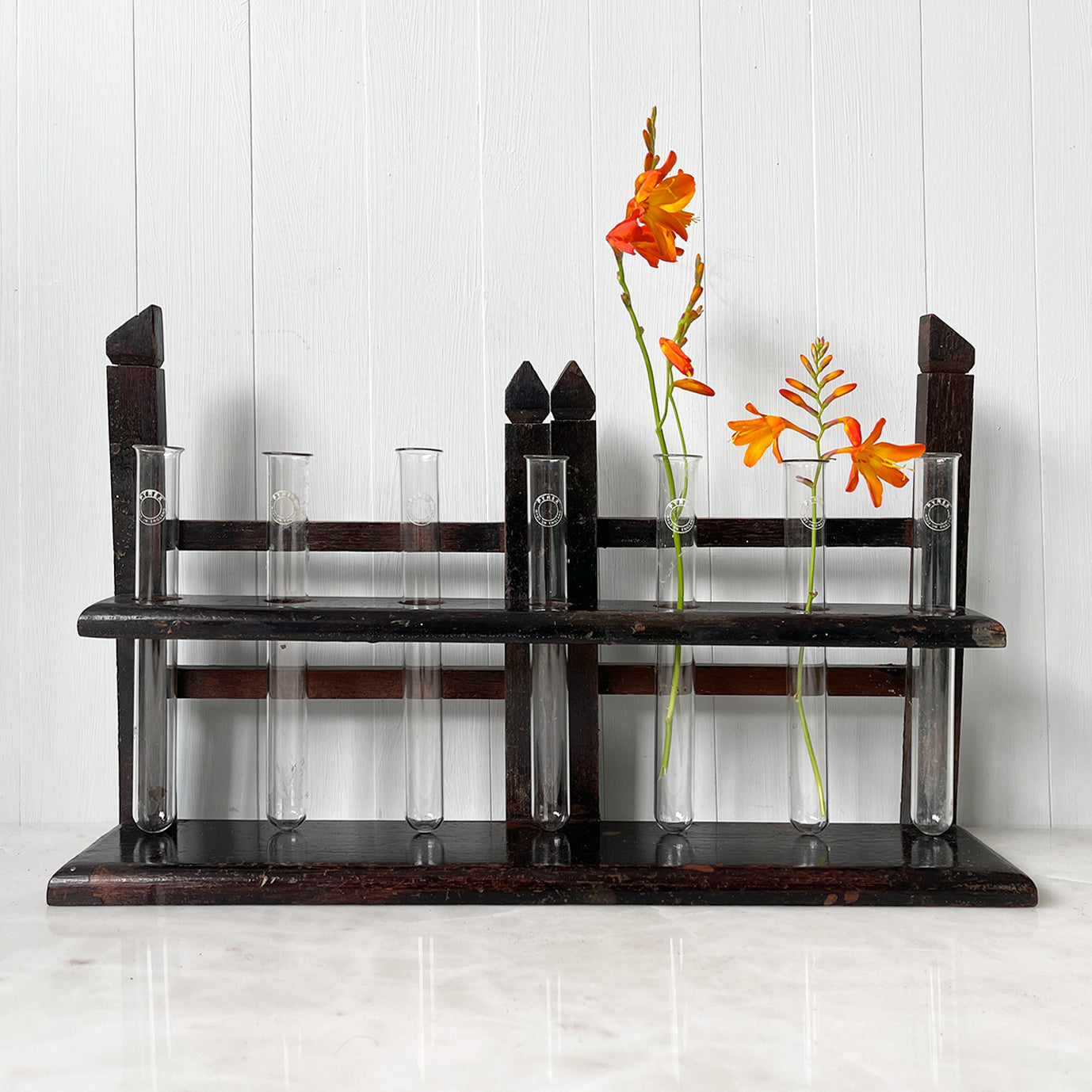 An Edwardian Test Tube Rack with seven Glass Pyrex test tubes. These racks are great for displaying sprigs of flowers - SHOP NOW - www.intovintage.co.uk