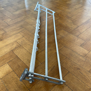 An Aluminium Art Deco Train Coat Rack, having three slats to the top section where you can place your hats and a bottom ball that has eight sliding coat hooks. The ends have a simple Art Deco styling to them - SHOP NOW - www.intovintage.co.uk