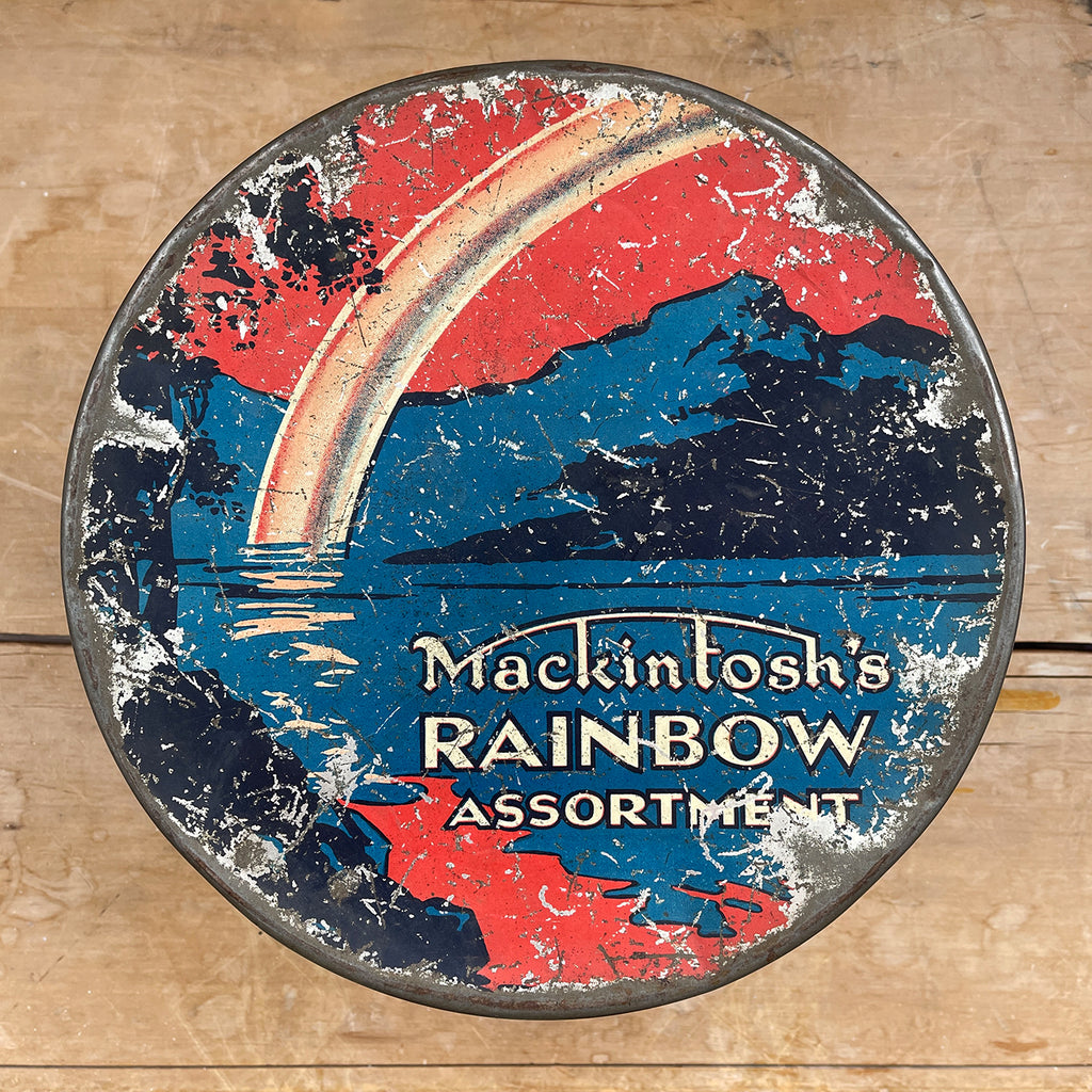 An early Mackintosh's Rainbow Assortment Tin from the 1930s with the most wonderful patina and a design very much of the period. - SHOP NOW - www.intovintage.co.uk