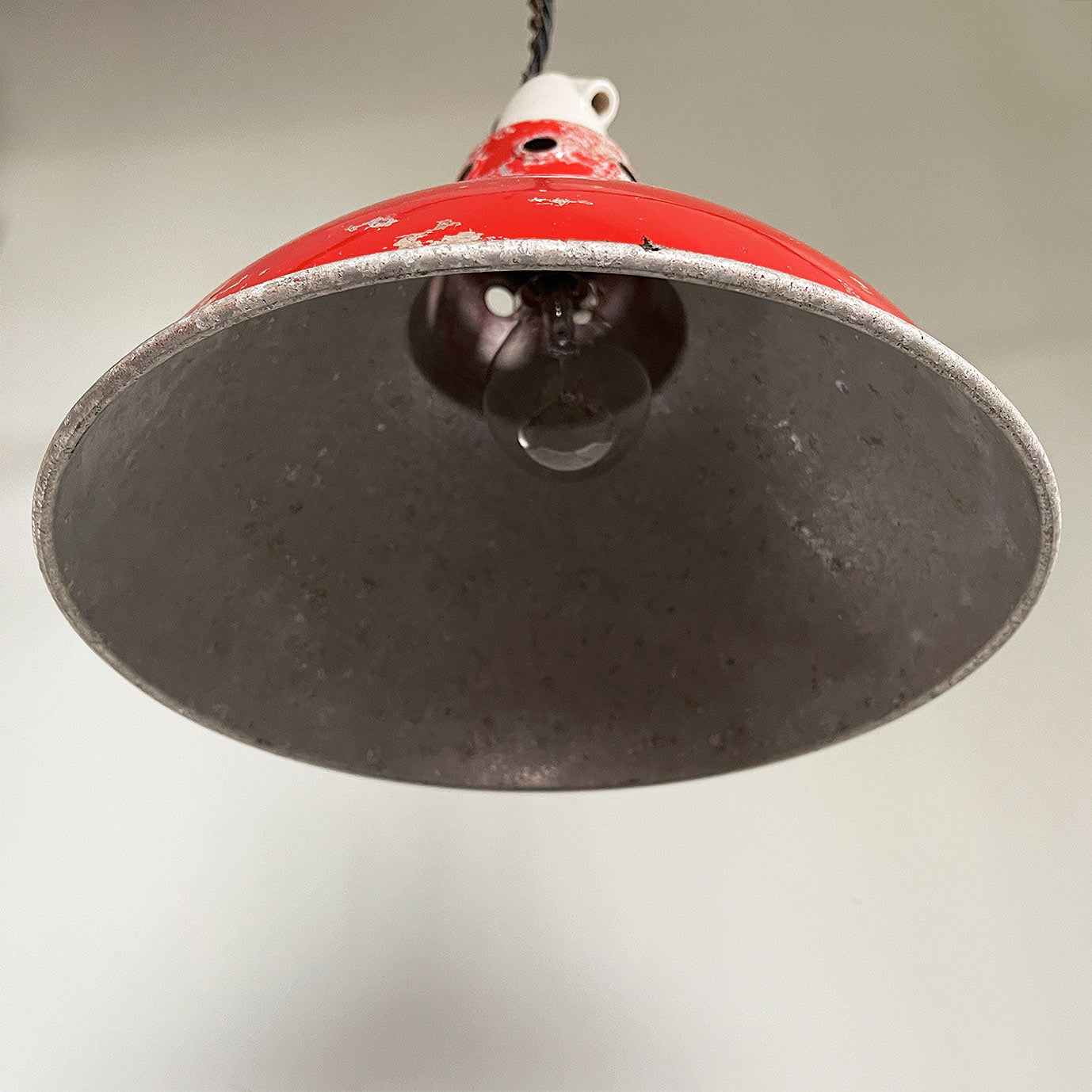 There's a fantastic Patina on this Vintage Red Industrial Shade. The red colour really pops and with the surface metal corrosion to the paint makes it a great fitting to juxtapose against a modern clean setting - SHOP NOW - www.intovintage.co.uk