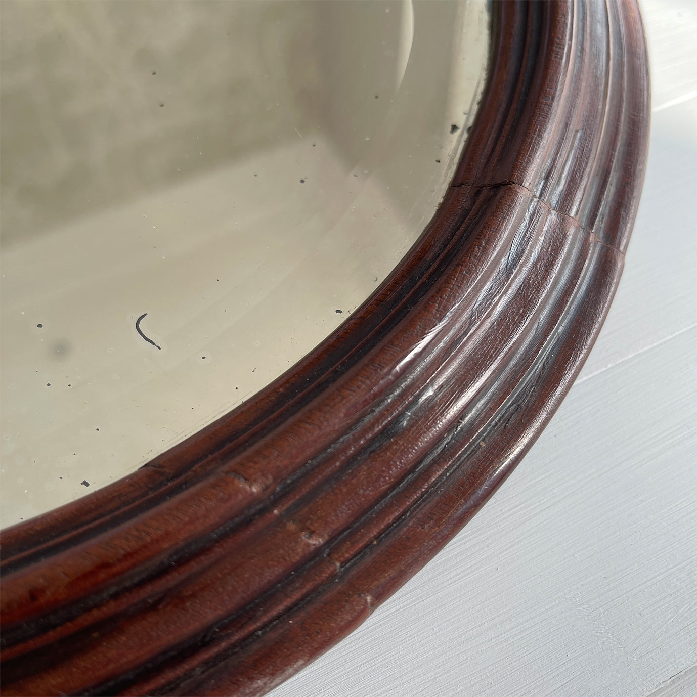 An Antique Wall Mirror with nicely profiled mahogany frame and original beveled glass mirror plate. Backed with a thick mahogany cover and period hanging loop - SHOP NOW - www.intovintage.co.uk
