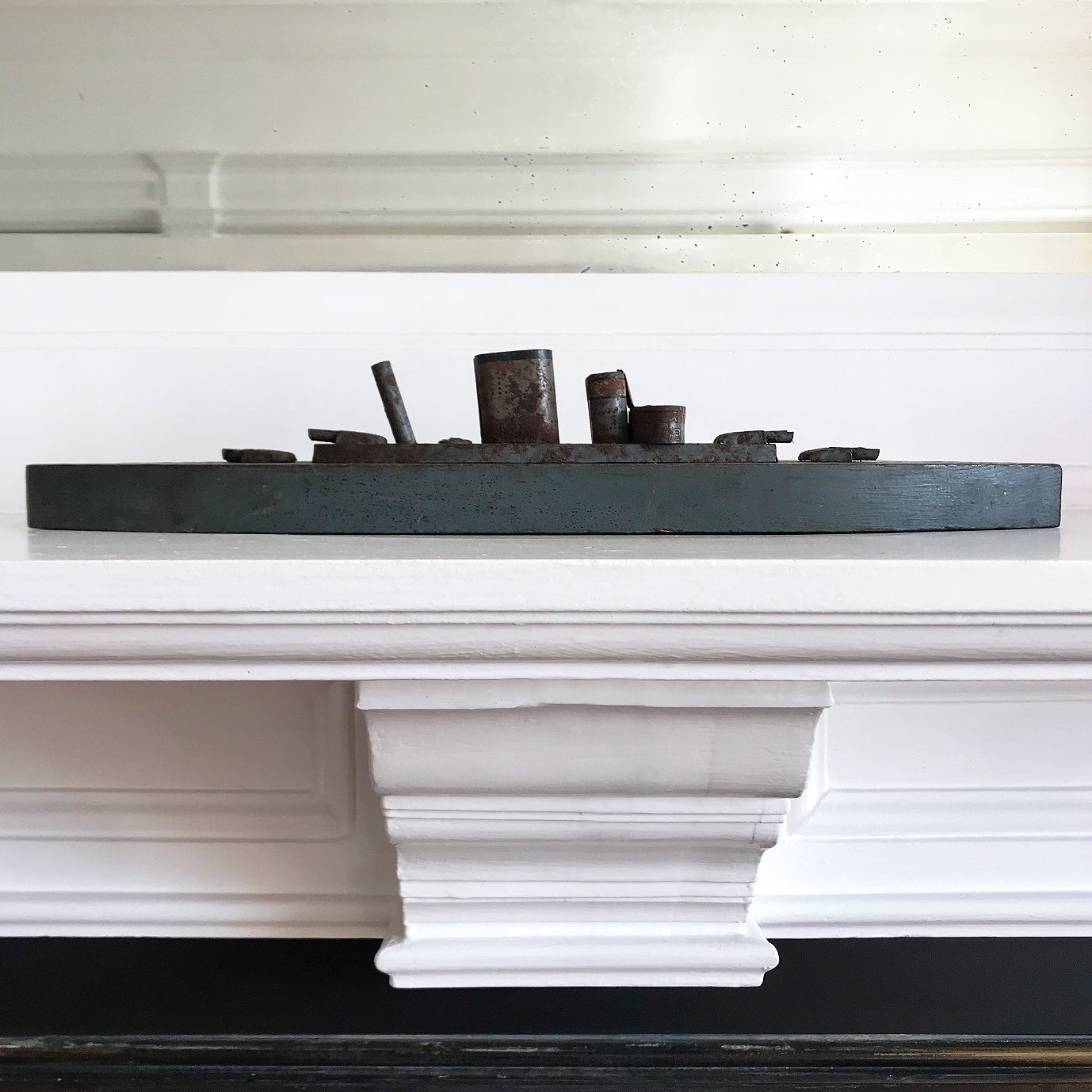 In rust we trust... Stylish old wood and lithographed tin plate battle ship with a great patina. Four gun turrets, three funnels and bridge with tiny sailors at the helm - SHOP NOW - www.intovintage.co.uk
