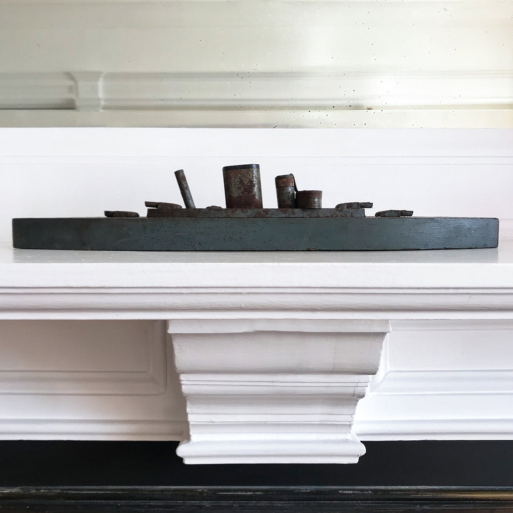 In rust we trust... Stylish old wood and lithographed tin plate battle ship with a great patina. Four gun turrets, three funnels and bridge with tiny sailors at the helm - SHOP NOW - www.intovintage.co.uk