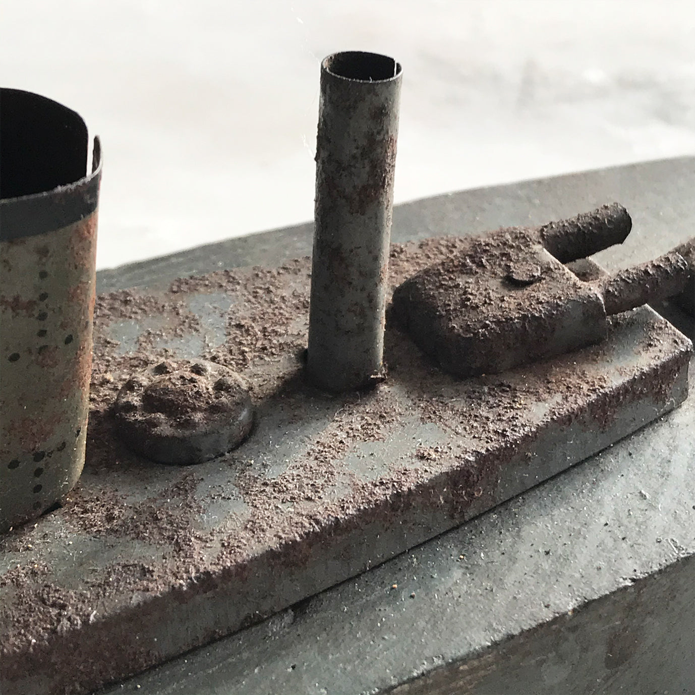 In rust we trust... Stylish old wood and lithographed tin plate battle ship with a great patina. Four gun turrets, three funnels and bridge with tiny sailors at the helm - SHOP NOW - www.intovintage.co.uk