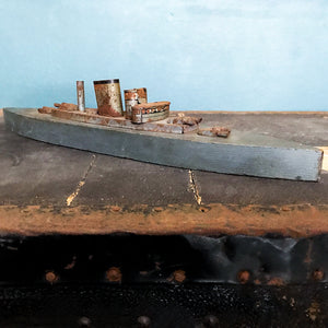 In rust we trust... Stylish old wood and lithographed tin plate battle ship with a great patina. Four gun turrets, three funnels and bridge with tiny sailors at the helm - SHOP NOW - www.intovintage.co.uk