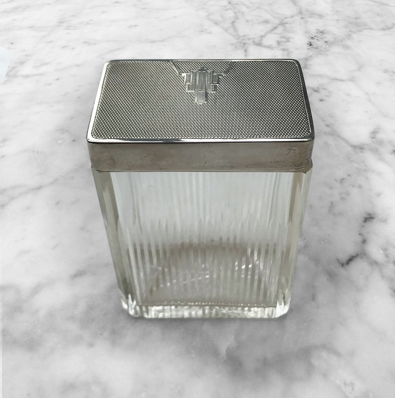1935 Art Deco English hallmarked solid silver and cut glass rectangular dressing table or soap jar by William Neale of Birmingham.Superior quality with large heavy weight engraved Art Deco motif silver top with a gilt interior - SHOP NOW - www.intovintage.co.uk