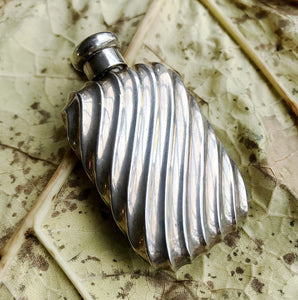 Beautiful Sampson Mordan Victorian Silver Scent Bottle with a wonderful crimped style finish to the main body. Silver corked lined screw cap. The bottle bears clear hallmarks on the screw section underneath where the top sits for the London Assay Office with a date mark for 1887 - SHOP NOW - www.intovintage.co.uk