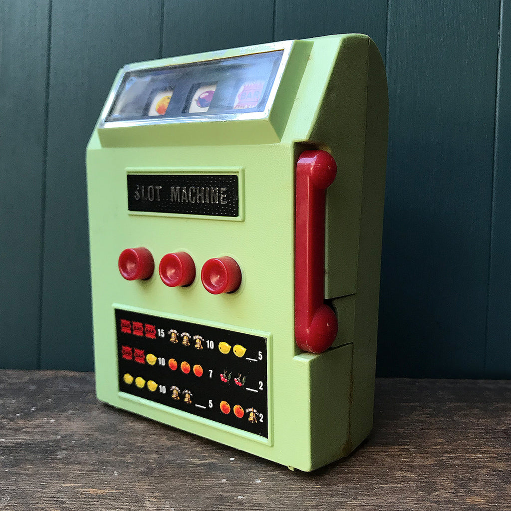 Cool vintage toy slot machine made by Waco in Japan, circa 1970. In working order and loads of fun! Pull down the lever press the buttons and see if you hit the JACKPOT! - SHOP NOW - www.intovintage.co.uk