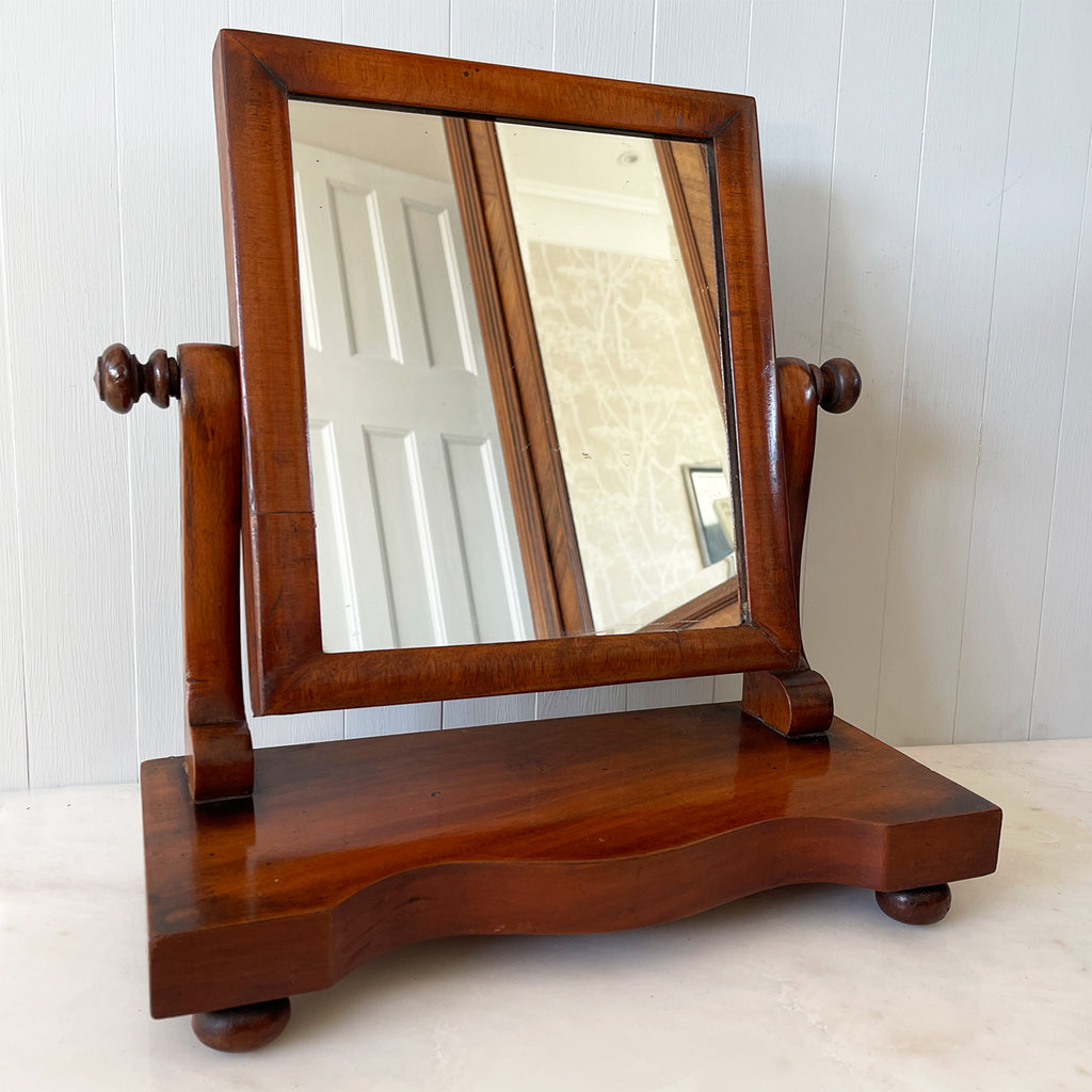 A pretty Petit Victorian Mahogany Dressing Table Mirror. Original mirror plate, bun feet to the base, veneered mahogany base. A very useful size - SHOP NOW - www.intovintage.co.uk