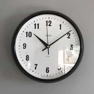 Vintage industrial/office electric Smith's wall clock from the 1940s, made by the English clock company Smiths. Made from brown/Tortoiseshell Bakelite which is in nice clean condition having been polished and waxed, with a white dial and retaining its original hands - SHOP NOW - www.intovintage.co.uk