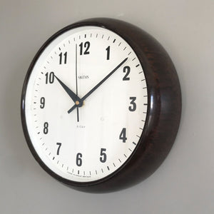 Vintage industrial/office electric Smith's wall clock from the 1940s, made by the English clock company Smiths. Made from brown/Tortoiseshell Bakelite which is in nice clean condition having been polished and waxed, with a white dial and retaining its original hands - SHOP NOW - www.intovintage.co.uk