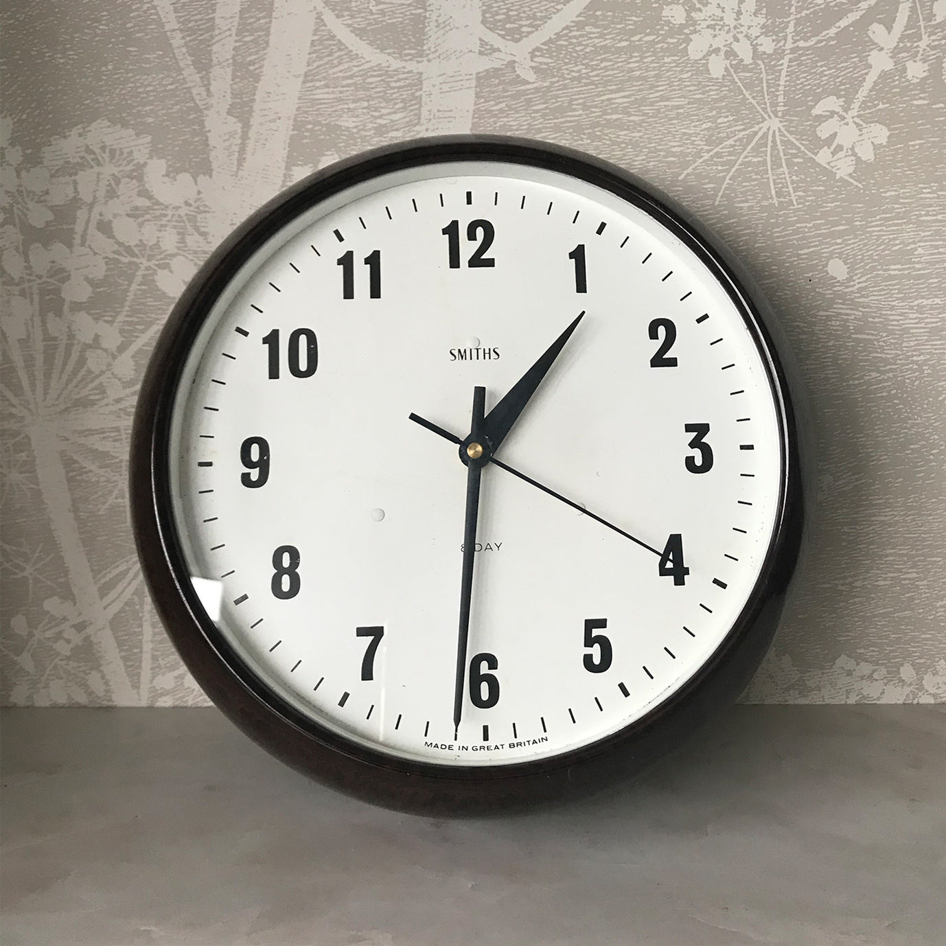 Vintage industrial/office electric Smith's wall clock from the 1940s, made by the English clock company Smiths. Made from brown/Tortoiseshell Bakelite which is in nice clean condition having been polished and waxed, with a white dial and retaining its original hands - SHOP NOW - www.intovintage.co.uk