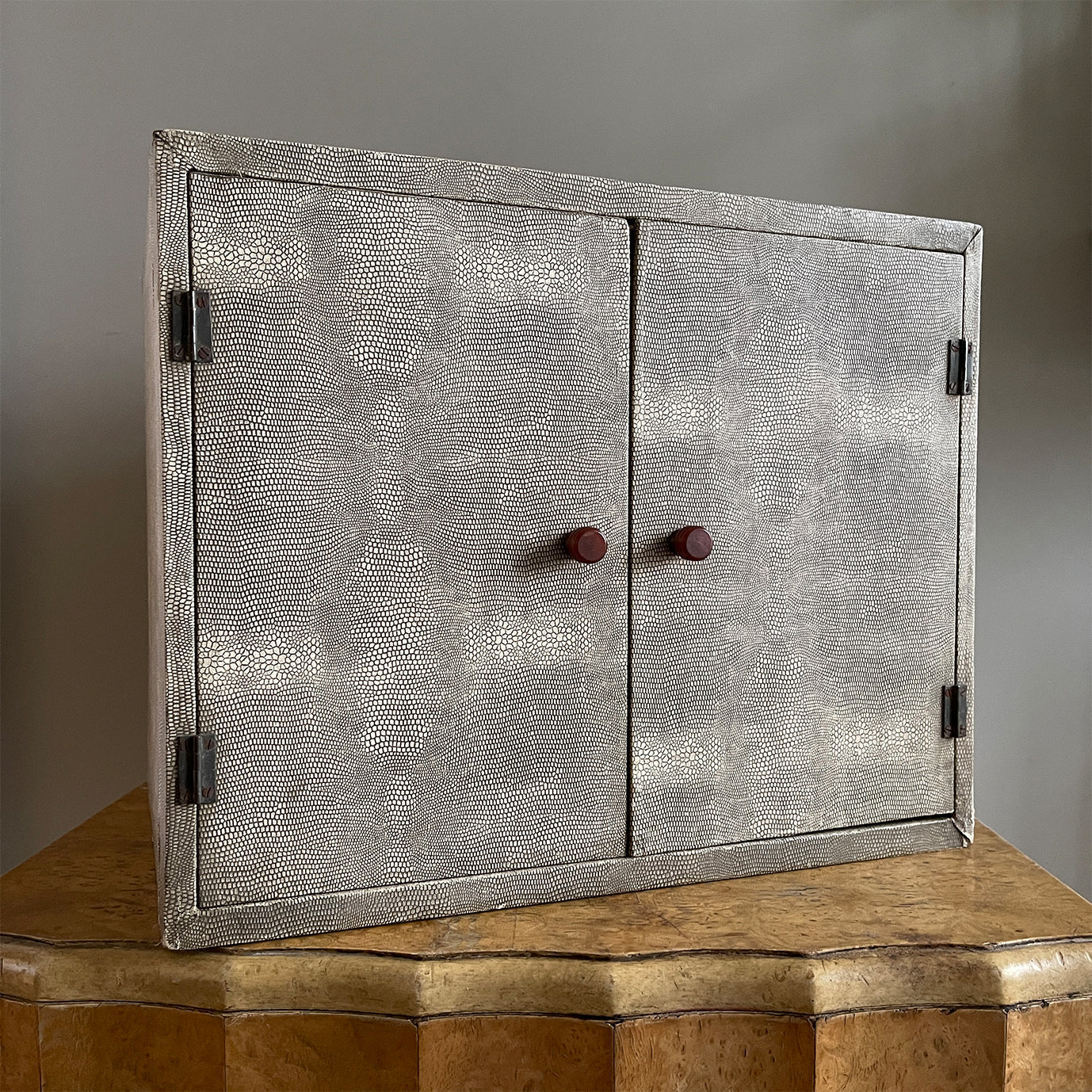 A rather good looking and very practical cabinet. The outer finish is of an original snakeskin paper which has achieved a wonderful tone of the years. Two pretty little original bakelite handles to the front doors with the inside having seven vertical compartments ideal for letters and correspondence - SHOP NOW - www.intovintage.co.uk