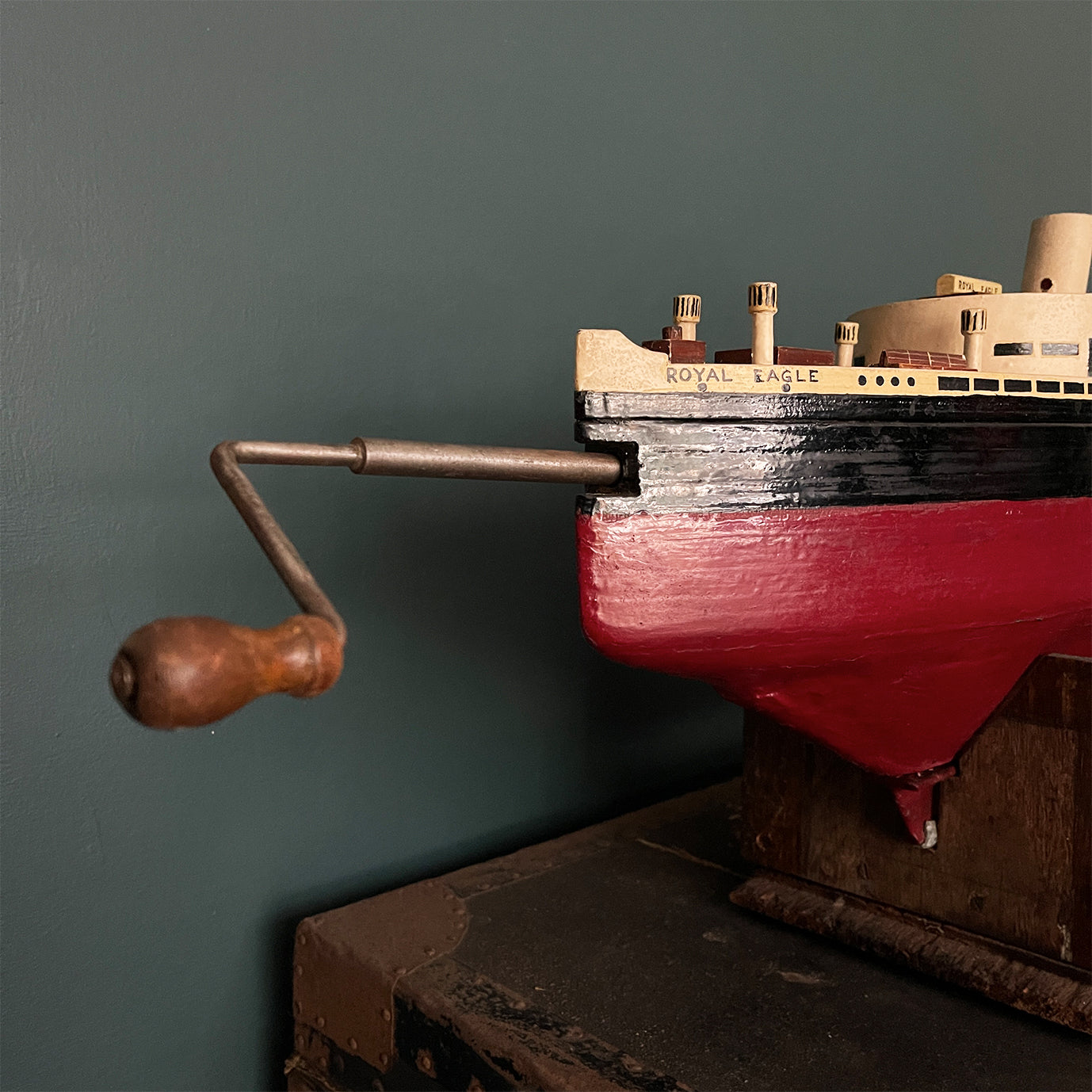 A wonderful large naive scratch built model of The Royal Eagle steam ship with an internal clockwork mechanism that drives the paddles. Comes with its original winder and handle that you clip on to make it easier to carry - SHOP NOW - www.intovintage.co.uk