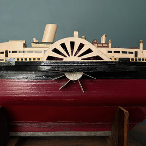 A wonderful large naive scratch built model of The Royal Eagle steam ship with an internal clockwork mechanism that drives the paddles. Comes with its original winder and handle that you clip on to make it easier to carry - SHOP NOW - www.intovintage.co.uk