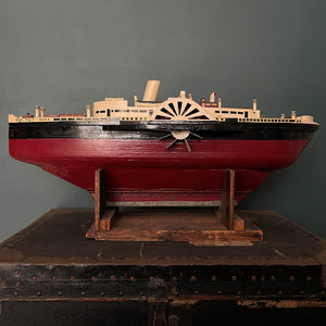 A wonderful large naive scratch built model of The Royal Eagle steam ship with an internal clockwork mechanism that drives the paddles. Comes with its original winder and handle that you clip on to make it easier to carry - SHOP NOW - www.intovintage.co.uk