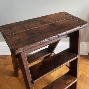 A Vintage Set of Dark Pine Folding Steps. With iron hinged stretchers and great colour and wear. They fold on a central hinge so nice and easy to store - SHOP NOW - www.intovintage.co.uk