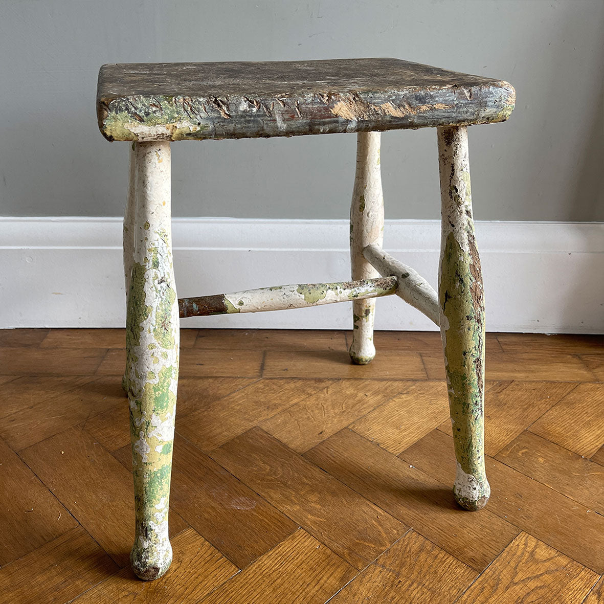 Good looking Vintage Painted Stool. Fantastic age age related wear and patina yet still totally solid. The green paint has worn and chipped away giving the stool that bang on look - SHOP NOW - www.intovintage.co.uk