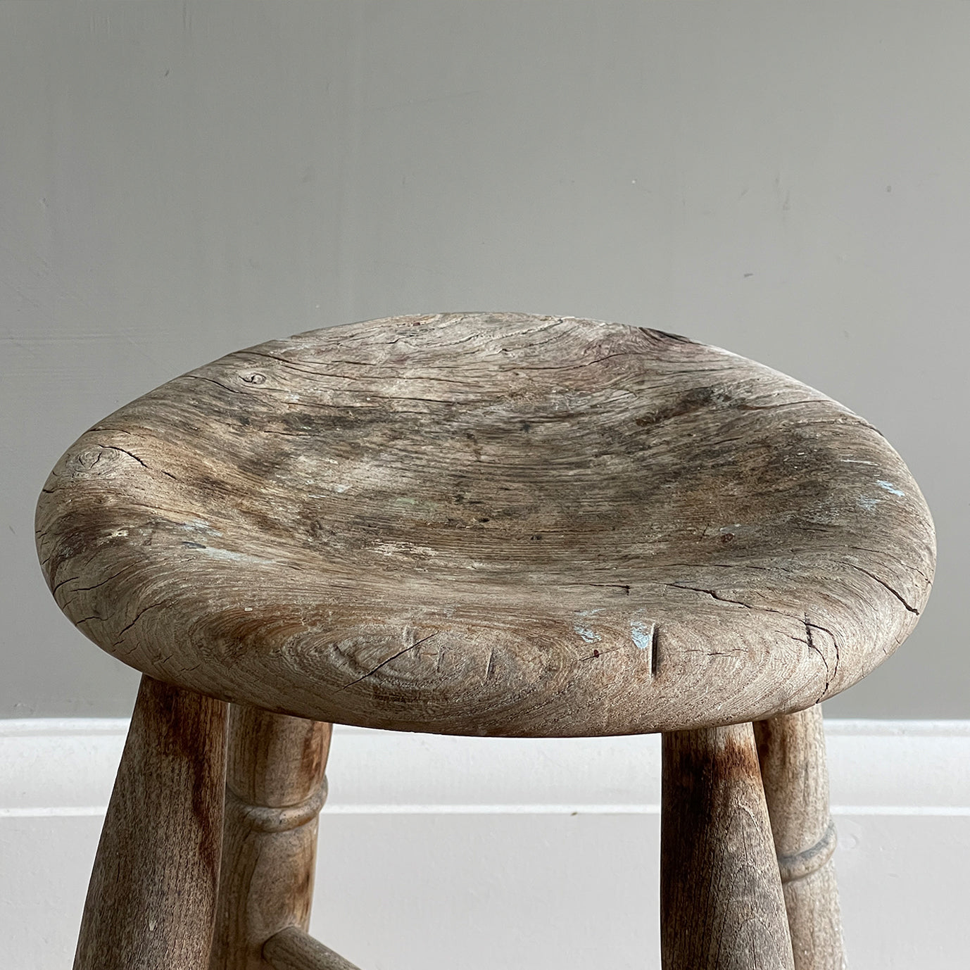 Vintage Elm Stool. Fantastic age age related wear and patina yet still totally solid. It had just enough weathering to give it that bang on look. The seat section has a wonderful dip to it, nicely turned legs and a superb centre joint on the cross stretchers - SHOP NOW - www.intovintage.co.uk