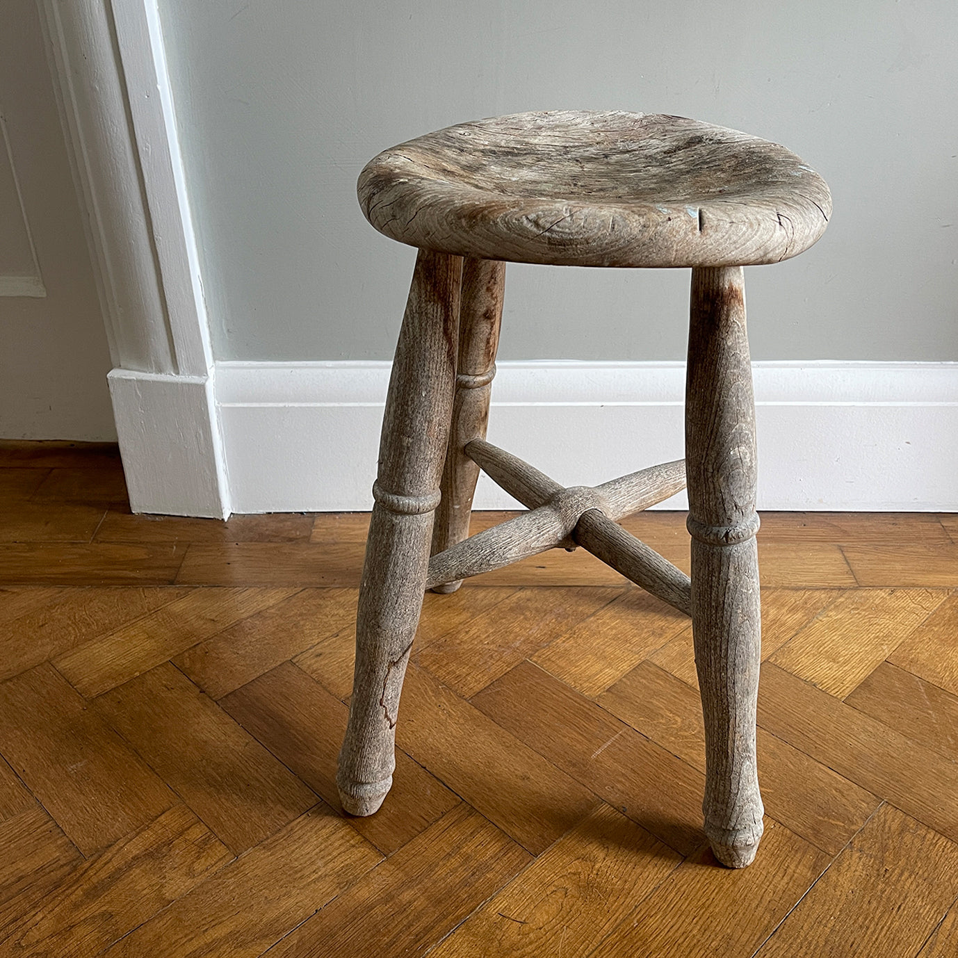Vintage Elm Stool. Fantastic age age related wear and patina yet still totally solid. It had just enough weathering to give it that bang on look. The seat section has a wonderful dip to it, nicely turned legs and a superb centre joint on the cross stretchers - SHOP NOW - www.intovintage.co.uk
