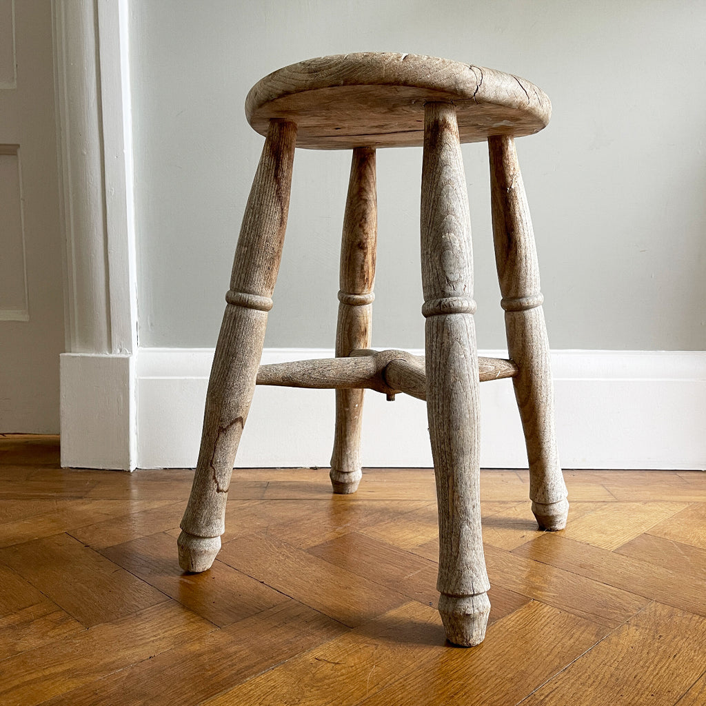 Vintage Elm Stool. Fantastic age age related wear and patina yet still totally solid. It had just enough weathering to give it that bang on look. The seat section has a wonderful dip to it, nicely turned legs and a superb centre joint on the cross stretchers - SHOP NOW - www.intovintage.co.uk