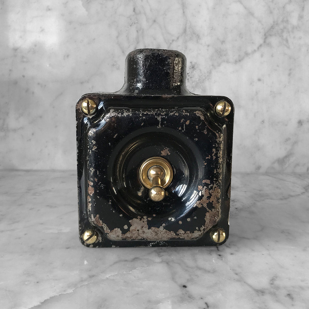 Metal Industrial Switch with a cast iron main body, pressed steel cover with brass toggle switch and brass cover screws with original finish. We have 3 of these switches in stock - SHOP NOW - www.intovintage.co.uk