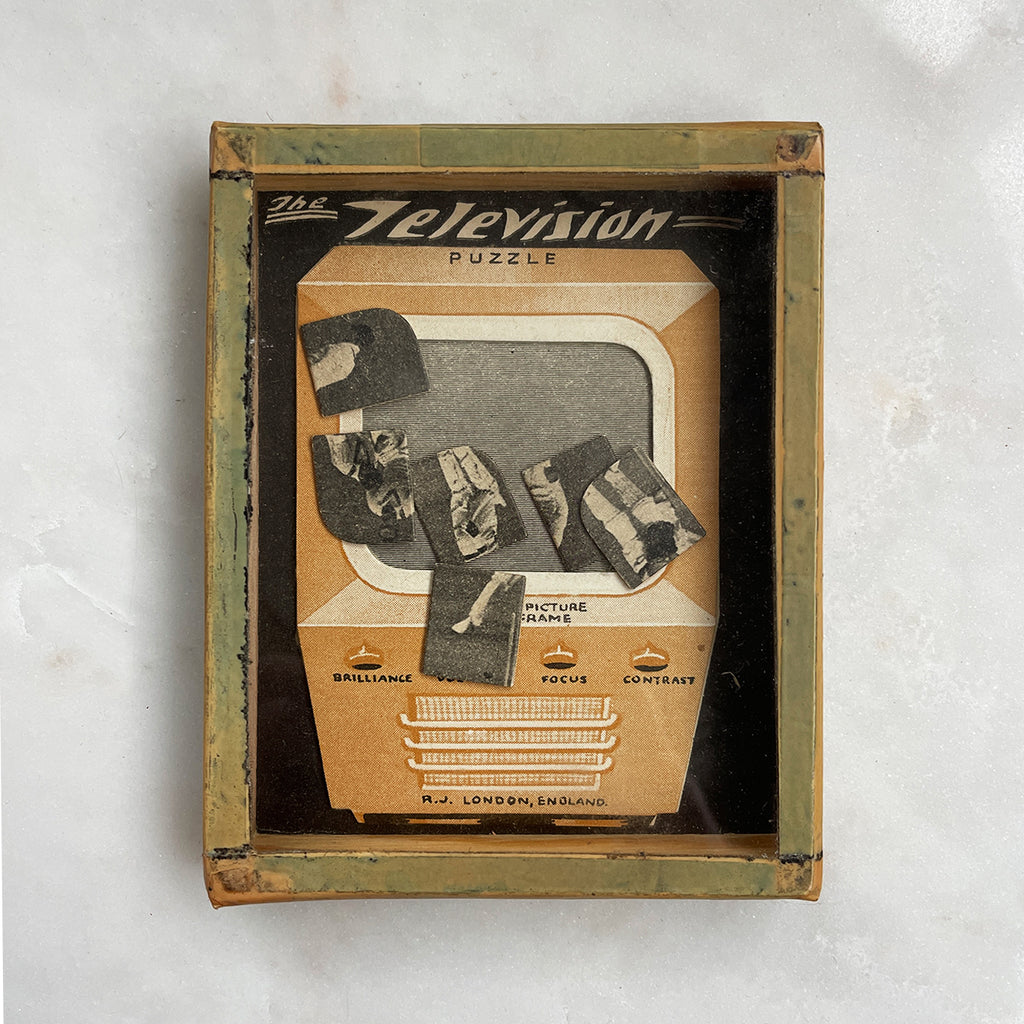 A Vintage TV Puzzle by R.Journet & Co. Shake the pieces of screen in to position on the screen of the TV. Hours of fun!  - SHOP NOW - www.intovintage.co.uk