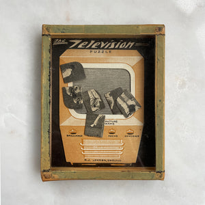 A Vintage TV Puzzle by R.Journet & Co. Shake the pieces of screen in to position on the screen of the TV. Hours of fun!  - SHOP NOW - www.intovintage.co.uk