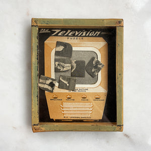 A Vintage TV Puzzle by R.Journet & Co. Shake the pieces of screen in to position on the screen of the TV. Hours of fun!  - SHOP NOW - www.intovintage.co.uk